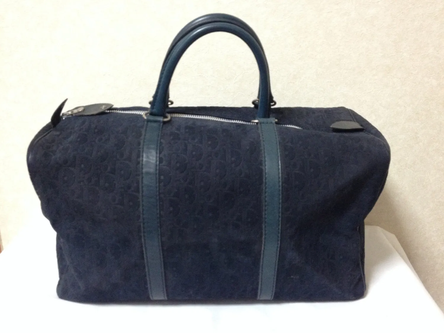 80's vintage Christian Dior Bagages navy genuine suede leather travel duffle bag, purse, handbag with embossed Dior logo allover. Unisex