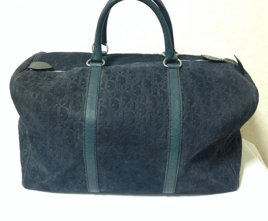 80's vintage Christian Dior Bagages navy genuine suede leather travel duffle bag, purse, handbag with embossed Dior logo allover. Unisex